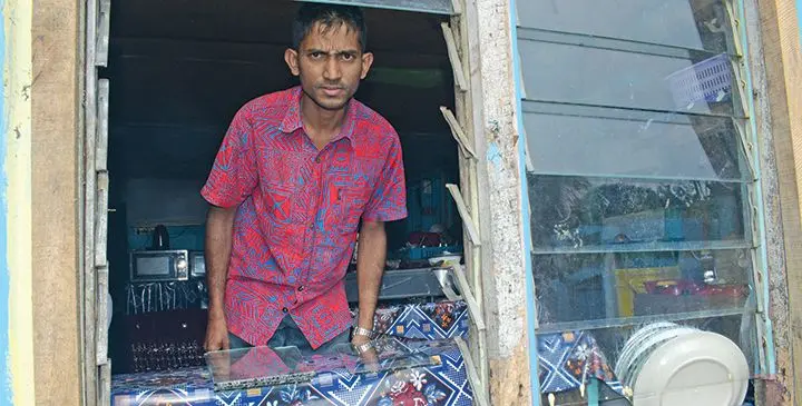 Ashish Sharma 28 of Muanivatu Settlement shows where the intruders gained entry into his home on July 30, 2019. Photo: Ronald Kumar