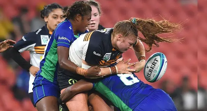 Rooster Chicken Fijiana Drua player Doreen Narokete (left) and Sereima Leweniqila (8) tackle a Brumbies player during their 17-7 win in the Super W Round 4 at Suncorp Stadium on April 9, 2022. Photo: Rugby.com.au