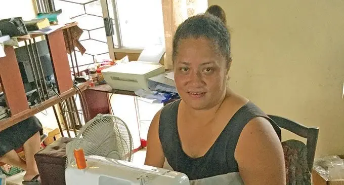 Marica Nukutabu Seruvatu sews a necktie at her family home in Reki Street, Raiwai on December 9, 2020.  Photo: Inoke Rabonu