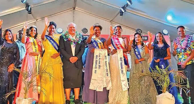 Deputy Prime Minister and Minister for Tourism and Civil Aviation, Viliame Gavoka (fourth from left), and on his right is the reigning queen Bulou Buteiove with contestants and Vodafone executives at Kasabia grounds, Sigatoka.