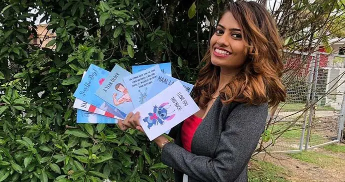 Darshika Raj with her designed cards.