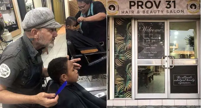 Salon workers giving free haircuts to school children.