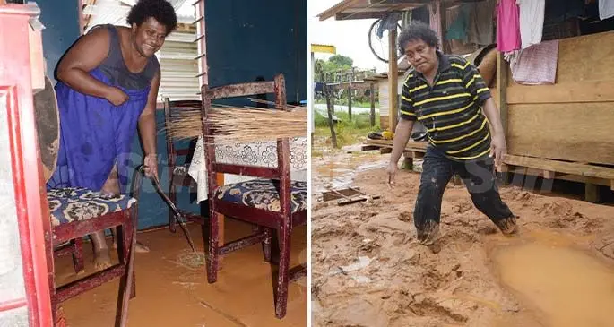 From left-right: Meredani Nakayaca, 50 clean her house following flash flooding in Davuilevu, Nausori and Titilia Saluvanua 51 walks through mud brought with flash flooding in their home and compound at Davuilevu, Nausori on March 9, 2021. Photos: Ronald Kumar.