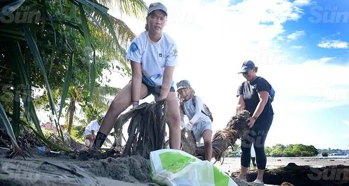 The Brodie family of Lami (from left) Reese, Carlie and Torika Brodie help in the cleaning up of the Lami foreshore on March 27, 2021. Photo: Ronald Ku