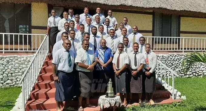Nadi rugby players and officials present the Farebrother-Sullivan Trophy to the Tui Nawaka Ratu Asaeli Driu at Nawaka Village, Nadi. Photo: Waisea Nasokia