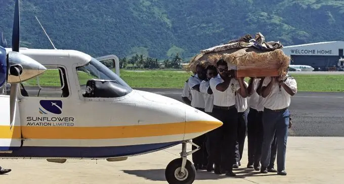 Pacific Flying School instructors carry the casket of the late Iliesa Tawalo at the PFS Hangar in Nadi after the flight from Nausori on March 8, 2018.   Photo: Waisea Nasokia
