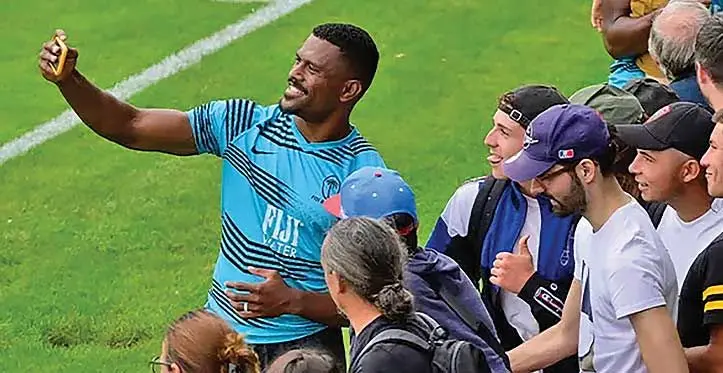 Flying Fijian winger Jiuta Wainiqolo takes a selfie with fans in Pornic, France, on August 13, 2023. Photo: France TV