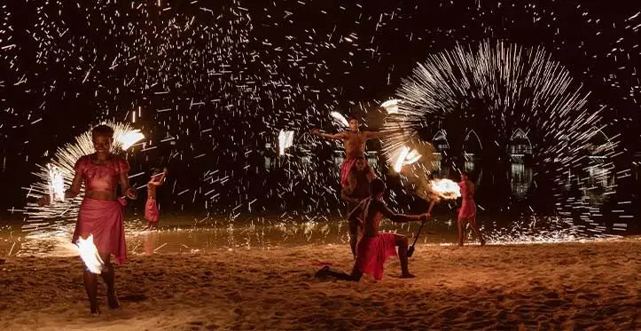 VOU dance group performs a fire dance during the Sunset Series on April 9, 2023.