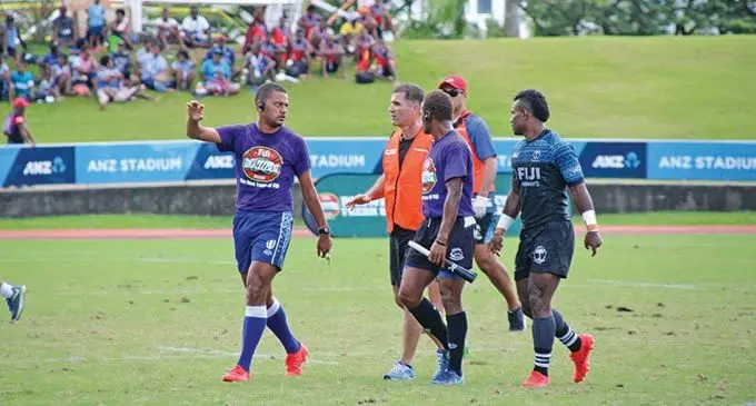 Fijian 7s coach, Gareth Baber (second from left) questions referee Tevita Vosalevu on his decision while touch judge and Seremaia Tuwai looks on during the Fiji Bitter Marist 7s at the ANZ Stadium on March 27, 2021. Photo: Leon Lord