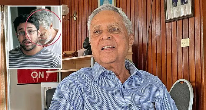 Former Prime Minister Mahendra Chaudhry was a hostage during the 2000 coup (circled behind his son Rajendra Chaudhry in inset photo).