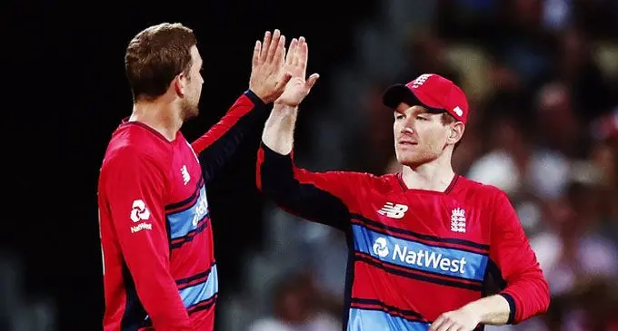 Eoin Morgan and Dawid Malan of England celebrate the wicket of Martin Guptill of New Zealand during the International Twenty20 at Seddon Park in Hamilton, New Zealand on February 18, 2018. Photo: Zimbio 