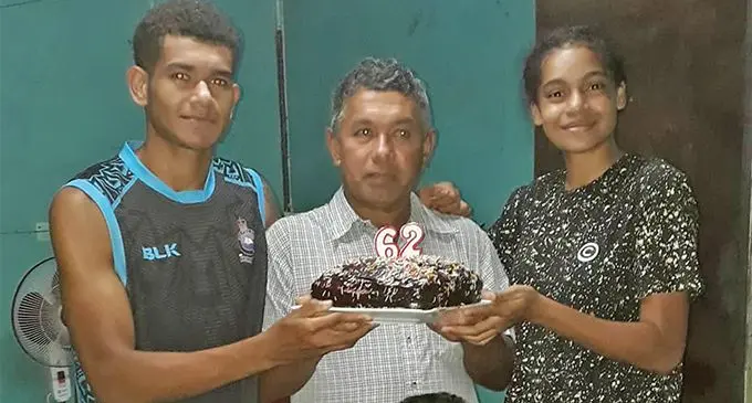 In happier times ... Daniel McCaig (middle) with his grandchildren at Vatukuro Settlement in Cakaudrove Province. 