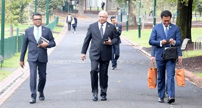 From left; Permanent Secretary to the Office of the Prime Minister Yogesh Karan, Prime Minister Voreqe Bainimarama and Fiji’s High Commissioner to Australia Luke Daunivalu are attending the 6th Australian Emission Reduction Summit in Melbourne. Photo: DEPTFO News