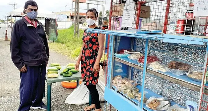 Sandhya Prasad sells vegetables and homemade sweets with husband, Anirudh Prasad at Tokotoko Road junction in Navua.  Photo: Ronald Kumar