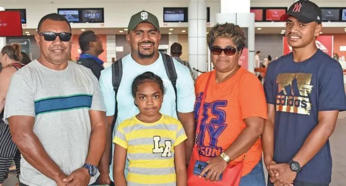 Fiji Airways Flying Fijians hooker Mesulame Dolokoro (second from left) with dad Kalisito (left) and mum Bale (third from left) along with his brother and sister at Nadi International Airport on November 10, 2019. Photo: Waisea Nasokia