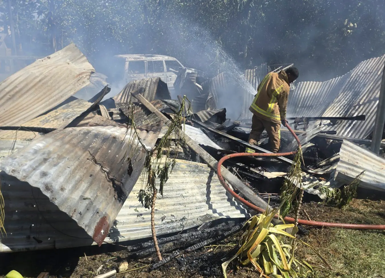 The National Fire Authority (NFA) confirmed that the blaze involved two lean-to houses accommodating 14 people, including six adults and eight children.