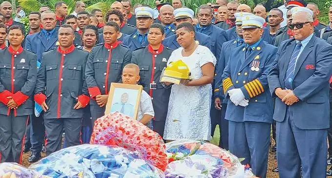The family and National Fire Authority workmates of the late Flying Fijian hooker, Jale Sassen, at the Tuatua cemetery, Labasa, on March 13, 2024. Photo: Sampras Anand