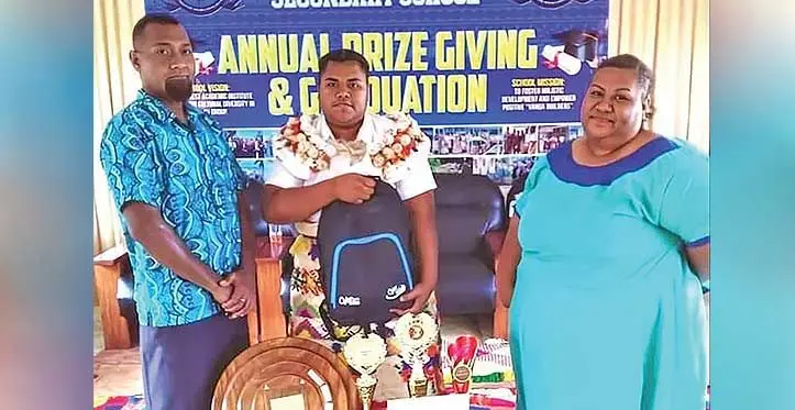 Ratu Finau Secondary School dux Salote Rosivulavula with her parents after the school’s prize giving ceremony on November 3, 2023.