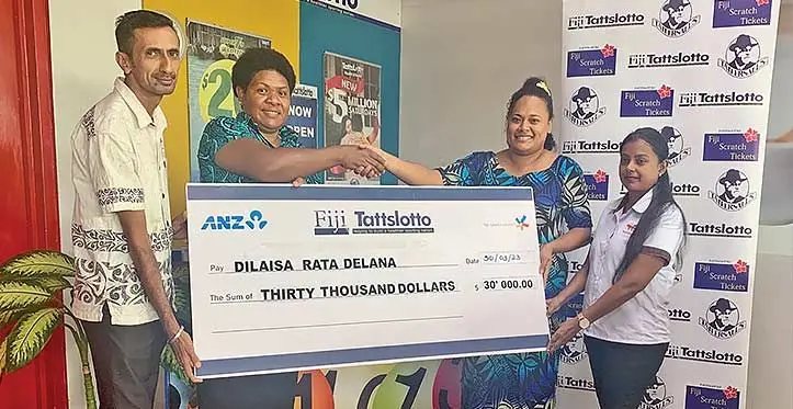 From left: Total Votualevu Service Station director Harveen Singh, winner Dilaisa Delana, Fiji Tattslotto senior manager Lusiana Tamarisi and site manager Swesta Prakash during the handover. Photo: Waisea Nasokia