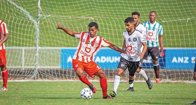 Labasa centreback Akeimi Ralulu controls the ball away from the Suva midfielders Ramzan Khan and Alex Saniel during the Digicel Premier League clash at the ANZ Stadium, Suva, on April 18, 2021. Photo: Leon Lord 