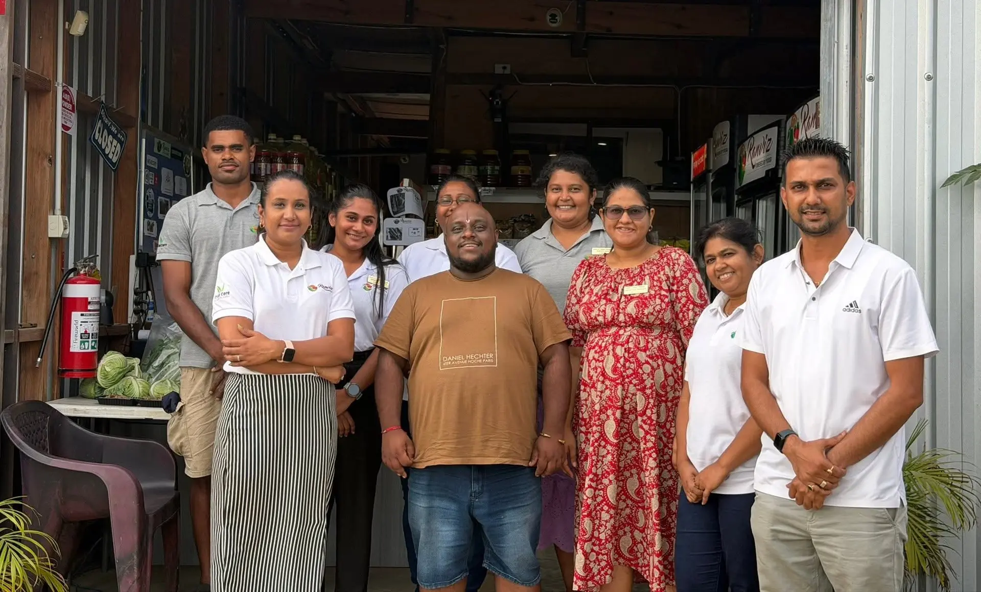 Renowned South African devotional singer Preven Moodley (brown shirt) with fans in Nadi.