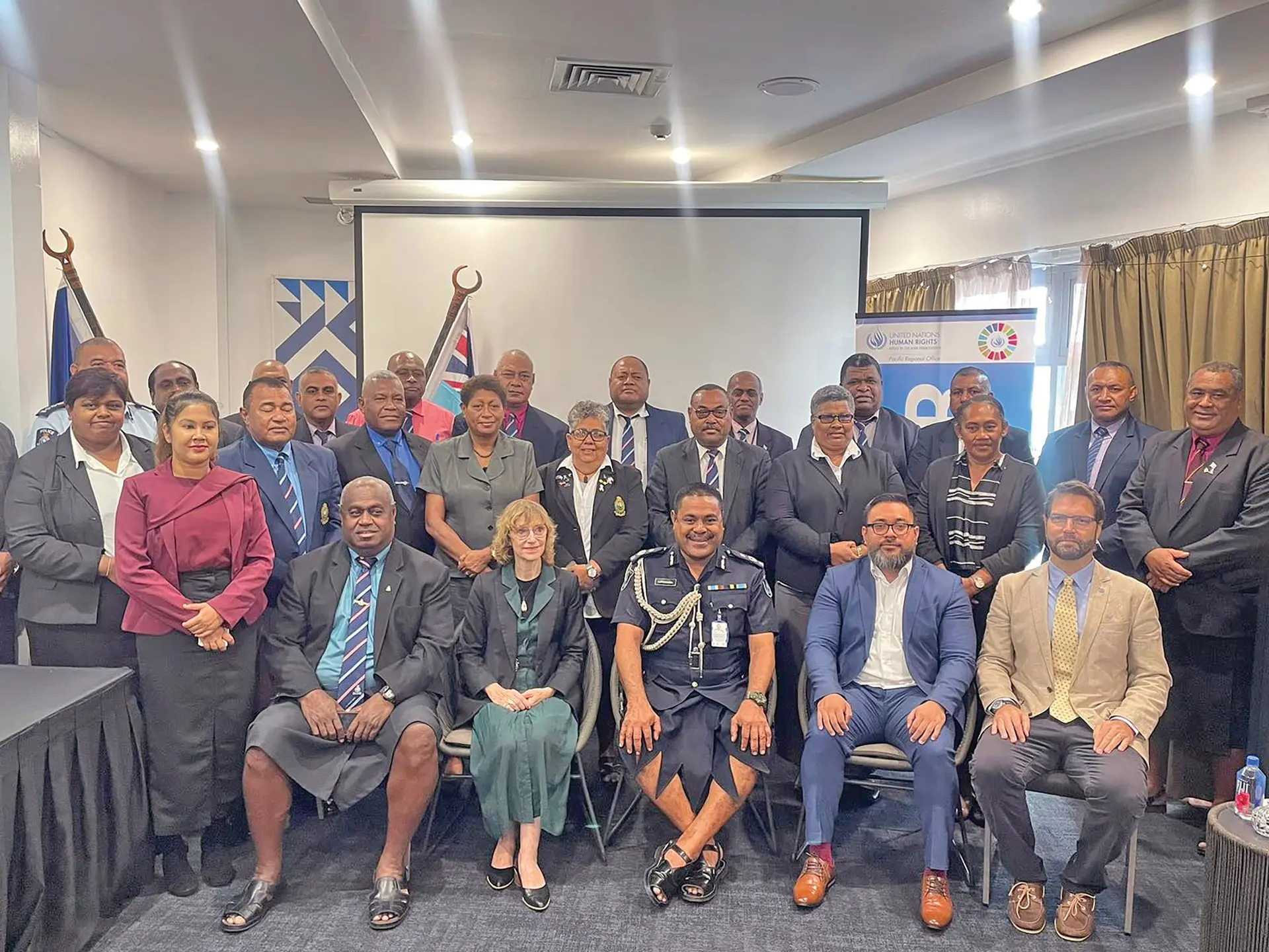 Acting Police Commissioner, Aporosa Lutunauga (seated, third from left), with other stakeholders during the validation workshop of the Police Act 1965 on December 16, 2025. 