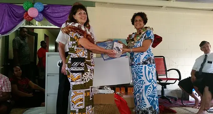  Sister Wendy Perry, left, of LDS Charities, hands over dispensary supplies to Chief Nurse Margaret Leong at Korovou, Tailevu.  Photo: LDS Charities