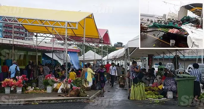 The marquee outside Suva market was put back up by council workers after it was damaged by strong winds on May 8, 2020. Photo: Ronald Kumar. Inset: The marquee blown down at the Suva market on May 8, 2020.