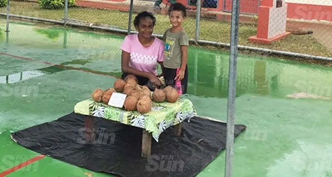 Vendor Losalini Sigakalele with her niece, Debora Sigakalele, at the mini-market in Tavakubu, Lautoka, on April 4, 2020. Photo: Nicolette Chambers