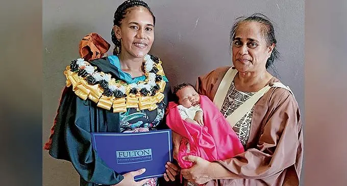 Fulton Adventist University College graduate Vasemeca Bogidrau, with her son Filimoni Savou and Primary Education Lecturer Akanisi Lanyon after the graduation ceremony at the Nadi campus in Sabeto on November 27, 2022. Photo: Salote Qalubau