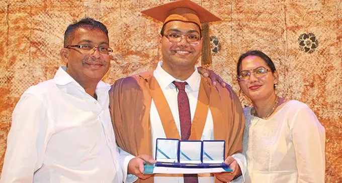 From left: Sharmila Singh, Nischal Raj Singh and Naveen Singh at the medals and prizes ceremony at the University of the South Pacific (USP) on March 19, 2019. Photo: Wati Talebula