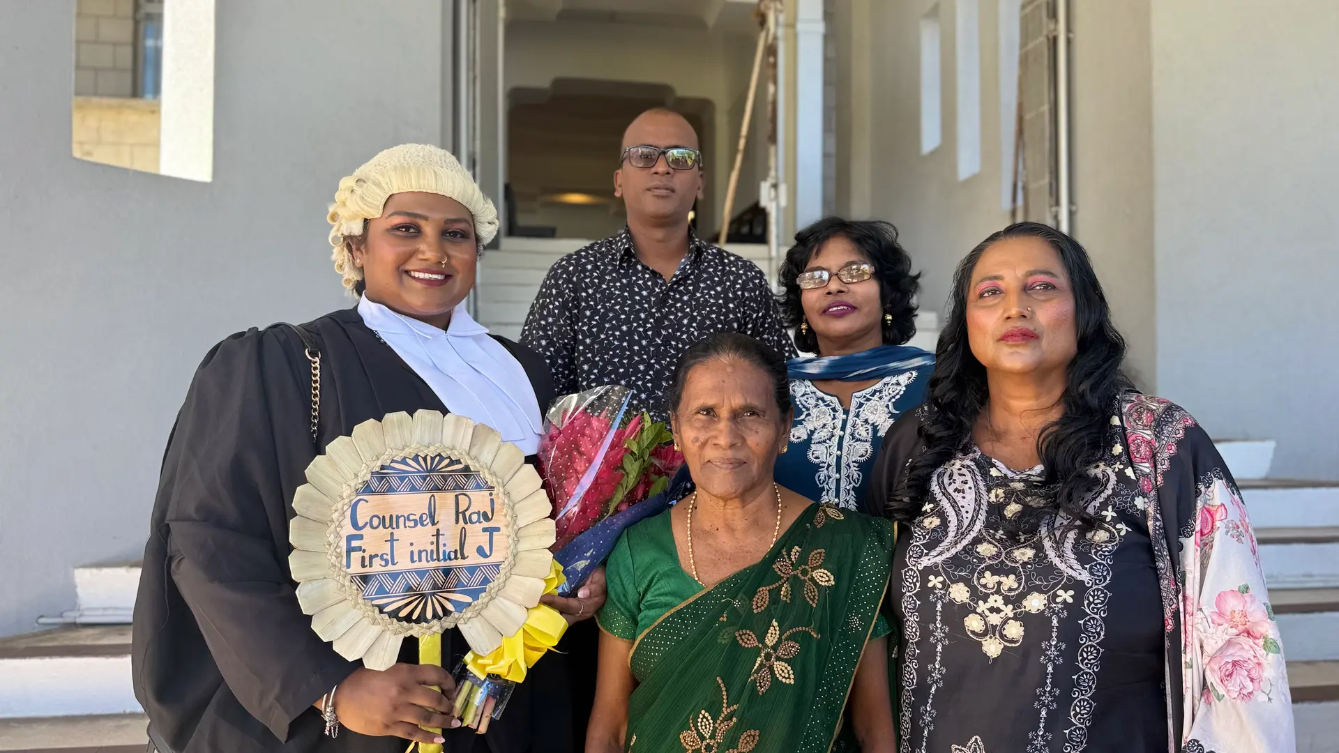 Newly admitted lawyer Joel Jocelyn Raj with her family