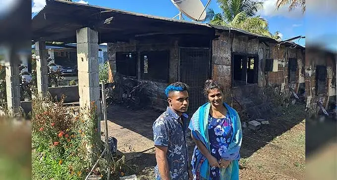 Mohammed Shamim with his mother Farina Bibi in front of their destroyed home. Photo: Waisea Nasokia