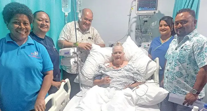 Australian tourist Carol Wallen after being revived by PSH Medical team pictured around her. Photo: Pacific Specialist Healthcare