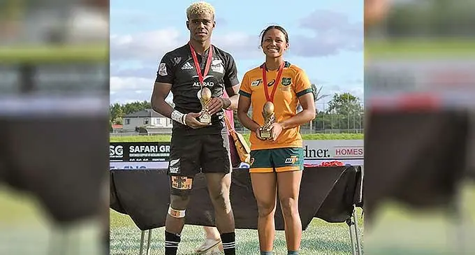 Waisake Salabiau (left) with his Most Valuable Player trophy. Photo: World Schools Rugby