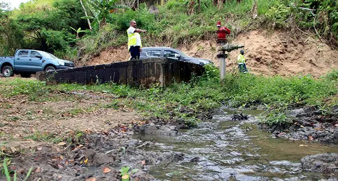 Water Authority of Fiji General Manager Customer Service Sekove Uluinayau points to a leakage where work is scheduled to take place this weekend. Photo: WAF