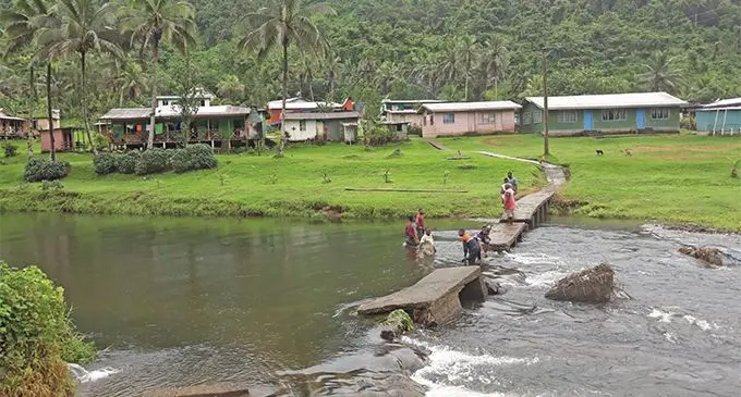 Narukunibua villagers in Namosi crossing the damaged bridge. Photo: Wati Talebula