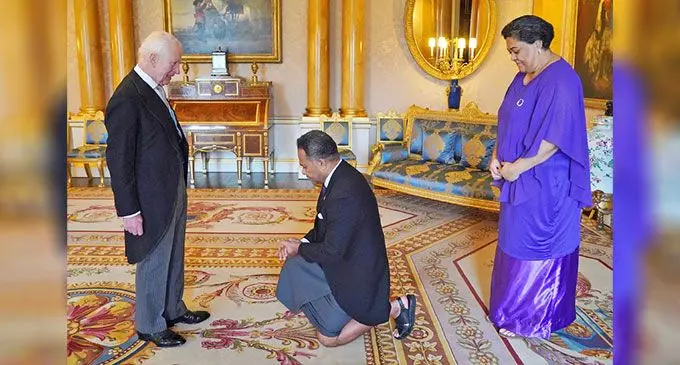 King Charles III holds an audience with the High Commissioner for the Republic of Fiji in London, Jovilisi Vulailai Suveinakama, and Nancy Evans at Buckingham Palace, London on  December 5, 2024. 