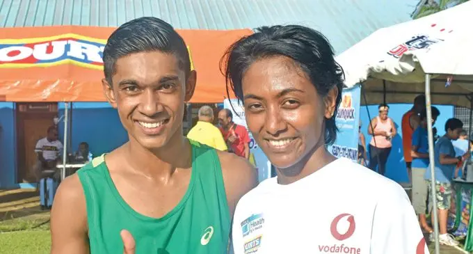 National rep Avikash Lal with Sharmila Lata at the SportsWorld Fun Run in Namaka yesterday. Photo: WAISEA NASOKIA