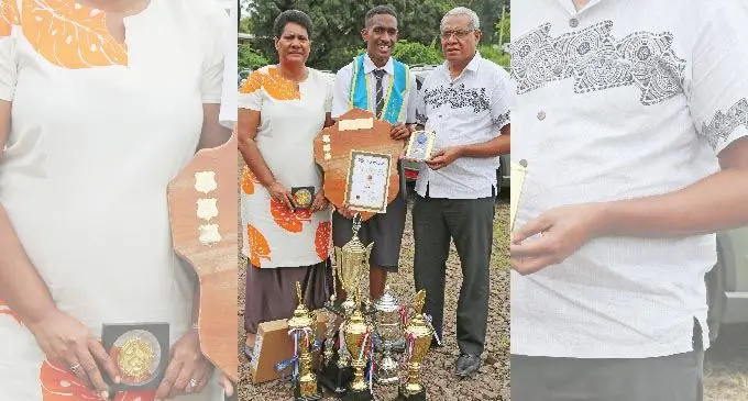 CMFI College Headboy and DUX receipient Taniela Kama with proud parents Jone and Nai Kama after the school graduation at the SDA Hall in Kinoya on October 3, 2019. Photo: Kelera Sovasiga  