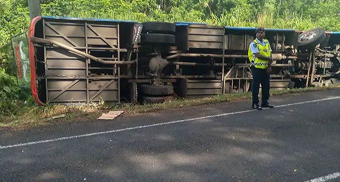 The bus flipped onto its side at the time of the accident, as the bus driver tries to avoid a collision. Photo: Kasanita Tukana