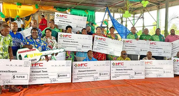 Fiji Pine landowners with their cheques with the Minister for Fisheries and Forestry, Alitia Bainivalu at the Fiji Pine headquarters at Drasa Sawmill Complex Lautoka on October 30, 2024. Photo: Shaniyah Khan
