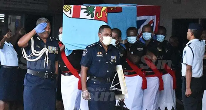 Members of the Fiji Police Force carry the casket of the late Inspector Elia Waqasoqo after his body arrived on the repatriation flight at the Nadi International Airport on October 5, 2020. Photo: Nicolette Chambers