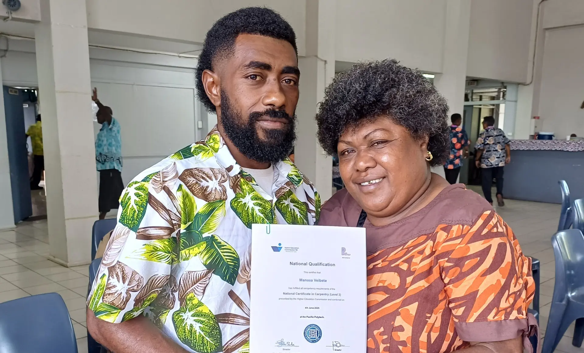 Manasa Veibete, of Banikea Village in Bua, with his mother Seini Tuvi after graduating with a National Certificate in Carpentry Level Three at the Labasa Civic Centre on Thursday. Mr Veibete hopes the qualification will help him secure employment and support his four children.