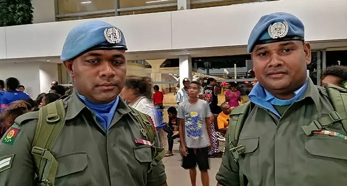 From left: Corporal Amenio Matevou and Corporal Jo Nawari at the Nadi International Airport. Photo: Mereleki Nai
