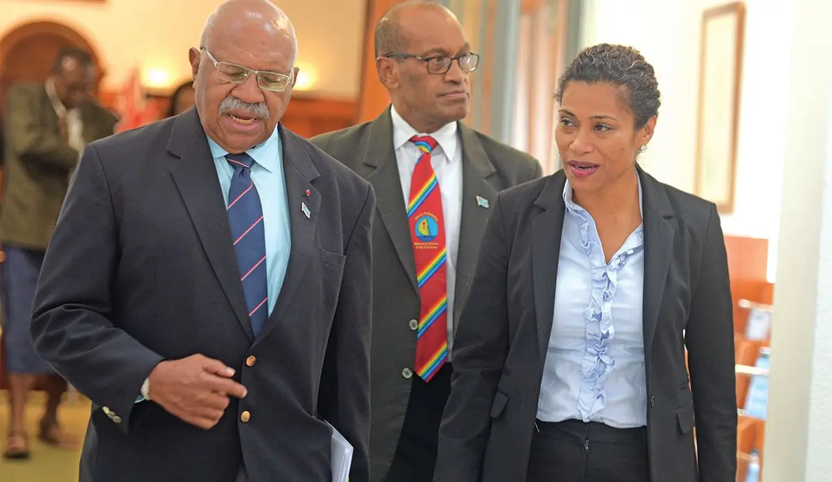 Opposition Leader Sitiveni Rabuka and Lynda Tabuya folloed by Minister for Infrastructure Jone Usamate outside Parliament February 15, 2019. Photo: Ronald Kumar.