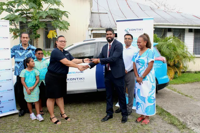 Leenne Dalton (fourth from left) of Kontiki Finance presents the keys to Diabetes Fiji Board of Trustees members Pranil Gounder (first from right) and Dr Ahmed Momtaz (second from right) at the organisation’s headquarters in Suva.