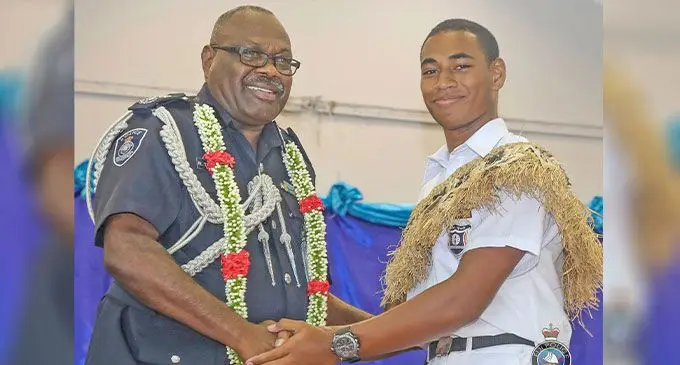 Commissioner of Police Rusiate Tudravu, with Mahatma Gandhi Memorial High School head boy Wame Vosayaco, on February 19, 2025. Photo: Fiji Police