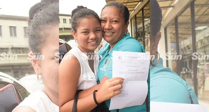 Athina Yee is congratulated by her mother, Stephanie Yee for passing her Year 12 Examination on April 1, 2022. Photo: Ronald Kumar.