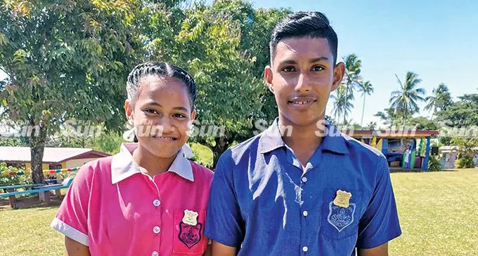 Tabia Sanatan Dharm Primary School head girl Teresa Timion (left) with head boy Ayush Chand during the prefect induction in Labasa on May 6, 2022.